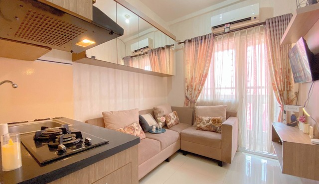 Good and Warm 2BR at Green Pramuka City Apartment