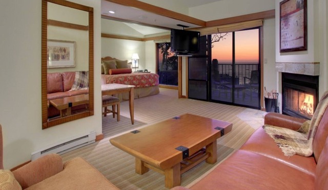 Gorgeous 1-bedroom residence with a private ocean-view balcony and a fireplace.