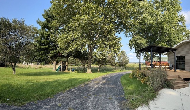 Gorgeous 10 acre farmhouse retreat-complete with outdoor entertainment space