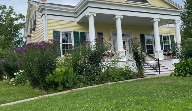 Gorgeous 1838 Greek Revival home in historic Seneca Lake with with lake access.