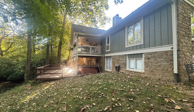 Gorgeous 4-bedroom home on 2-acre wooded lot w/creek, 8 miles south of downtown