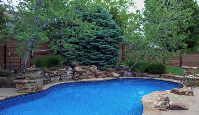 Gorgeous 5-bedroom house: private outdoor space with a pool and outdoor kitchen.