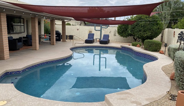 Gorgeous corner home with a private pool.