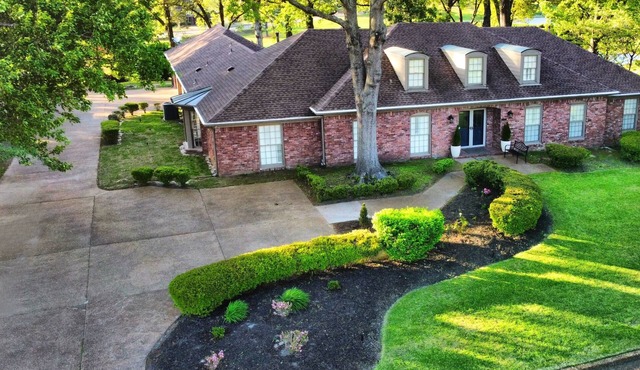 Gorgeous golf course view from the Signature Hole #12 at Colonial Country Club.