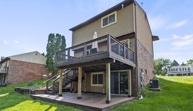 Gorgeous home W/ a ton of Space Over looking the Woods