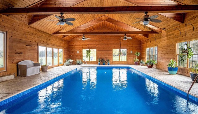 Gorgeous Home featuring an Indoor Heated Pool, Gourmet Kitchen & Outdoor Spaces
