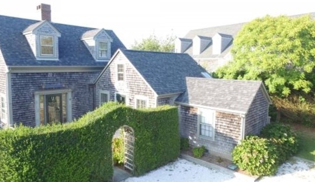 Gorgeous home in town 3Bed 3 bath. screened porch- 3 levels of living & parking