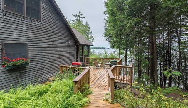Gorgeous lakefront home w/dock, canoe, kayaks & lake/forest views