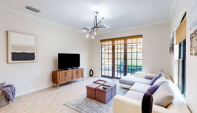 Gorgeous & modern sunlit oasis with pool, patio, tennis courts, gym, & W/D