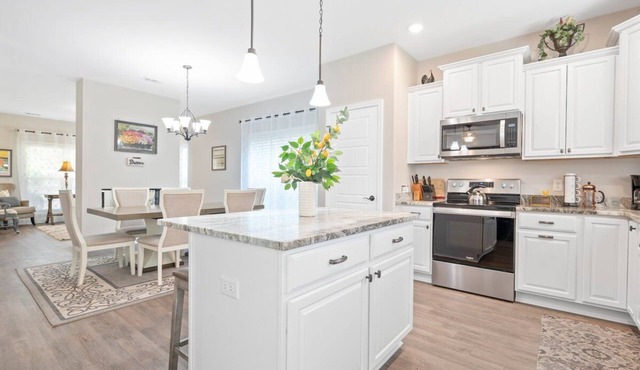 Gorgeous new home, one level & convenient location