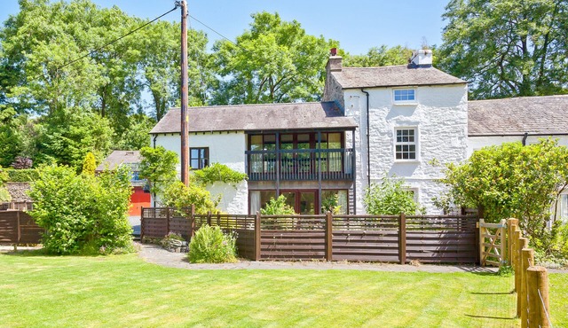 Gorgeous riverside cottage near Coniston Water. Off-road parking. EV Charger
