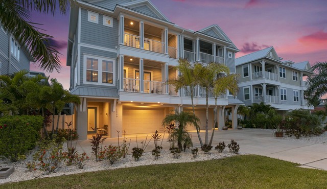 Gorgeous Sunsets in this beautifully appointed Townhouse steps from the Beach