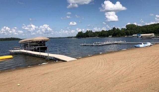 Gorgeous sunsets and a sugar sand beach in the heart of lakes country await you!