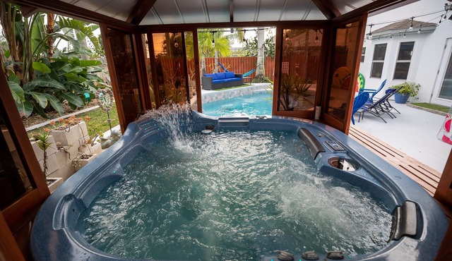 Gorgeous Urban Oasis W/hot Tub, Heated Pool And Private Movie Theater 3 Bedroom Home by RedAwning