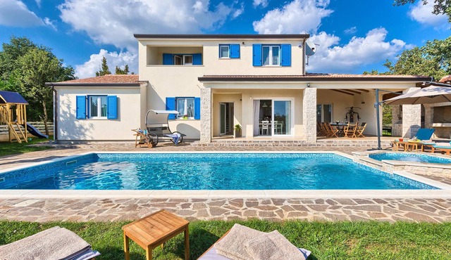 Gorgeous vacation home with pool and many extras.