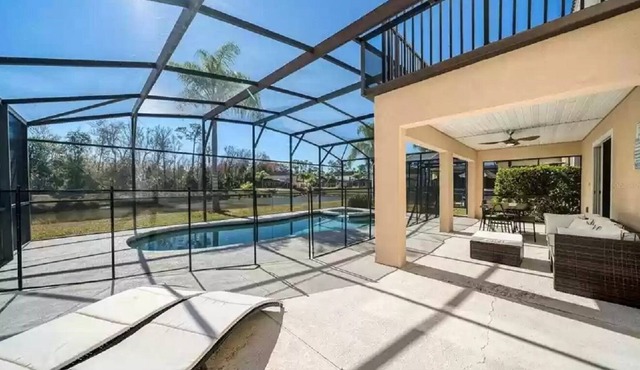 Gorgeous water view from South facing pool deck. Balcony off upstairs master bed