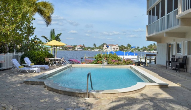 Gorgeous Waterfront Property On Vanderbilt Bay. Beach Access Just Steps Away!