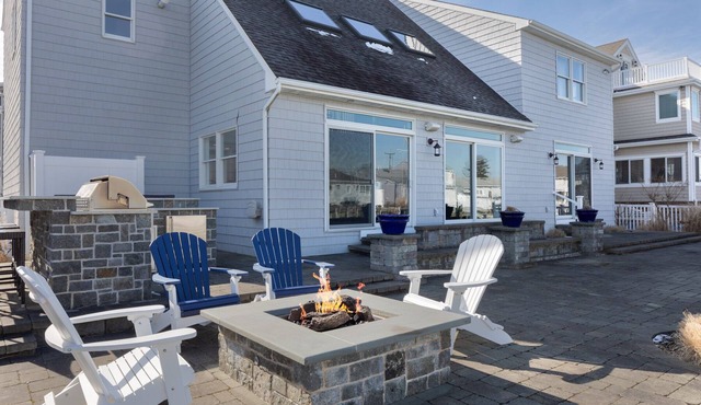 Gorgeous waterfront Home on lagoon steps away from private beach. Sleeps 12
