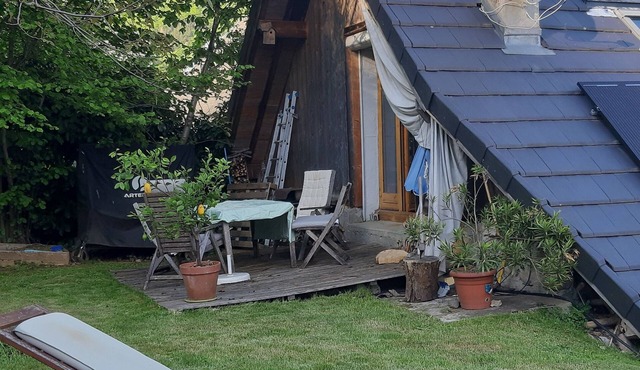 Grünes Haus in den Bergen