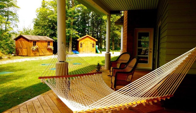 Grace House - an elegant retreat on a private lake. Swimming pool. Five bedrooms