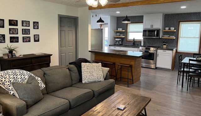 Graceful renovated home with pond near golf and town