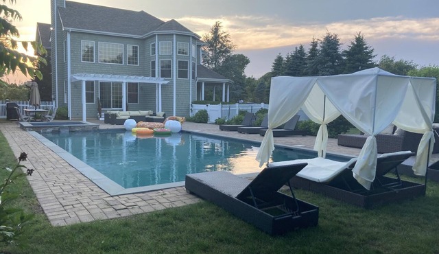 Gracious 6 Bedroom home with a backyard paradise minutes from Main Street