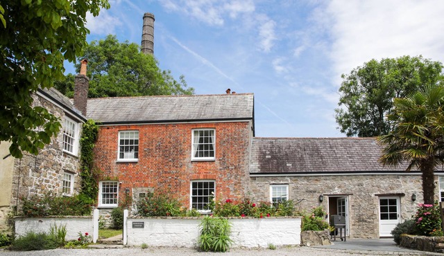 Grade II Listed former farmhouse, set within two acres of gardens and grounds