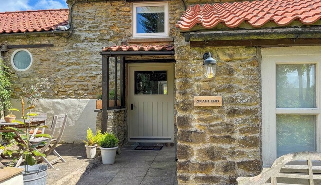 Grain End Cottage is set in large landscaped gardens.