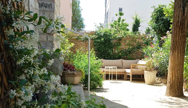 Grand Appartement de 75m2, 2 Chambres et Jardin