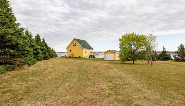 Grand Père Point - Sun-Filled 3-Bedroom Coastal Retreat with Beaches Nearby