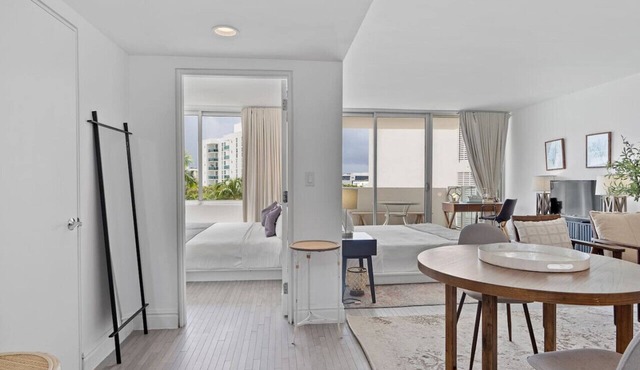 Grand Suite with Private Balcony, Pool, and Gym