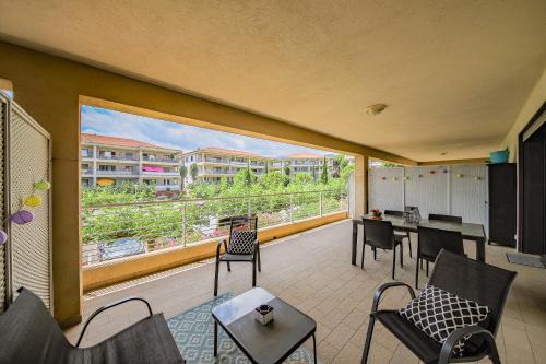 Grand T2 terrasse 27m2 plein sud Folelli centre