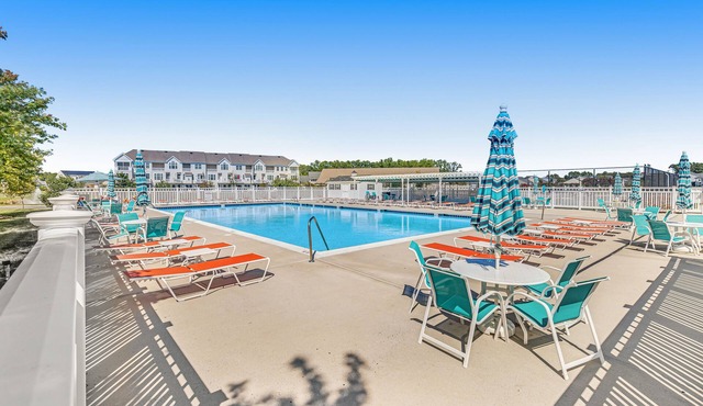 Grande at Canal Pointe home with patio, grill, fireplace, outdoor pool & tennis