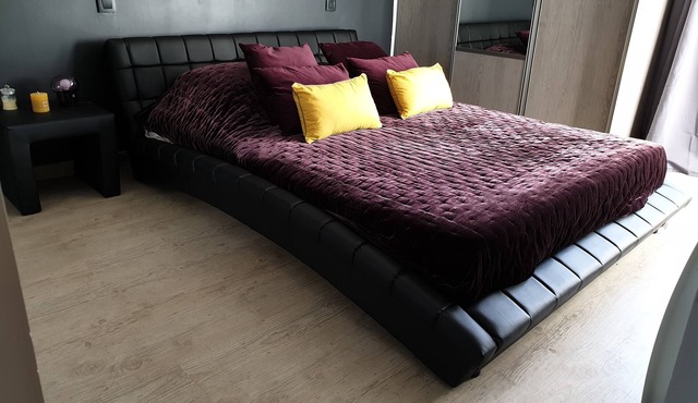 Grande suite privée avec lit queen size et terrasse privée