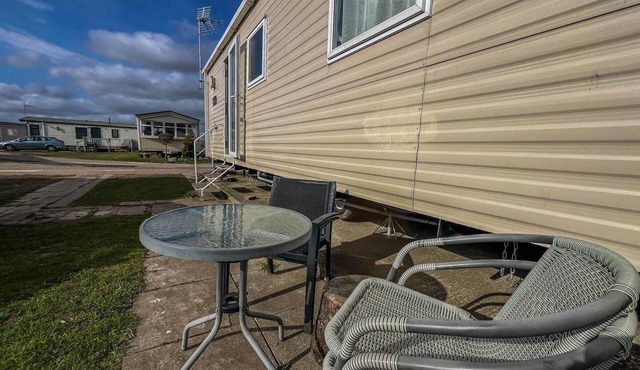 Great caravan with modern furnishings at Dovercourt Holiday Park ref 44007D