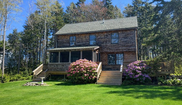 Great Location! Expansive deck with huge yard! Well maintained path to the rocky shoreline.
