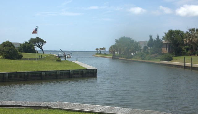 Great place to stay during the Big Rock. 4 bedrooms, private dock and marina.