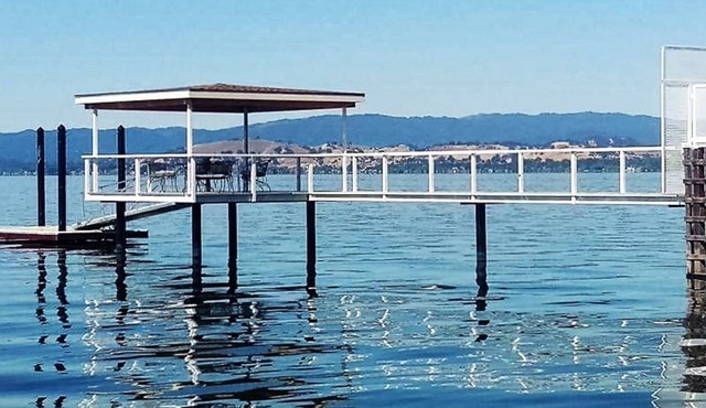 Great Price! Sunset Beach House private beach, firepits, hottub, dock, & more!