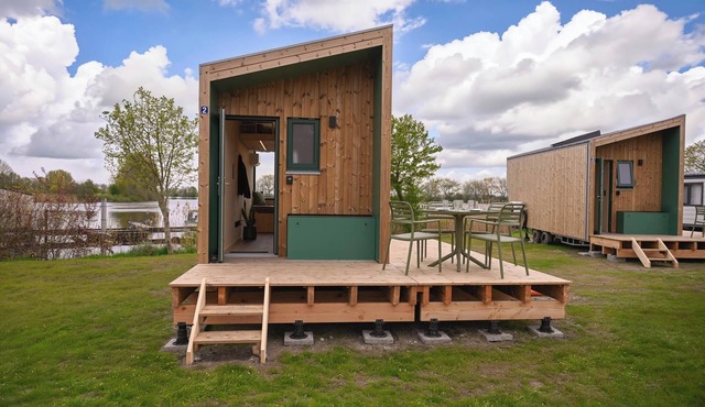 Green Tiny House Nook 2 - stylish cabin with Eider view in Schleswig-Holstein in Stapel