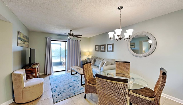 Ground-Floor Condo with Patio, Community Pool and Direct Beach Access.