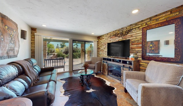 Ground-floor condo with on-site pool, grills, patio, & central AC