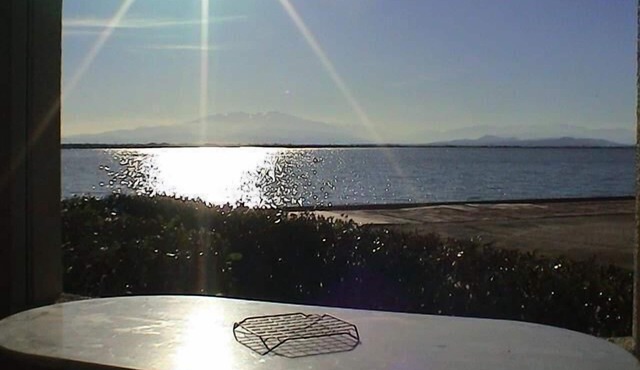Ground floor garden apartment with sea view and pools