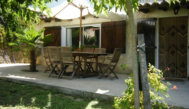 Ground floor garden apartment with sea view.