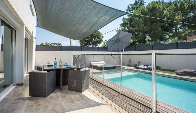 Ground floor semi-detached villa with private garden and swimming pool-close to sea and golf course