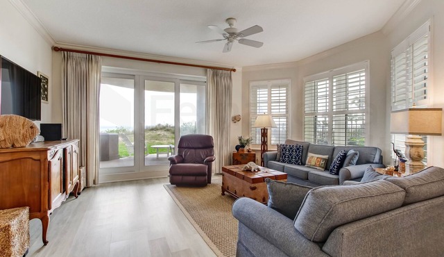 Ground floor unit in gated community. Tastefully decorated and located on southern end of Island.
