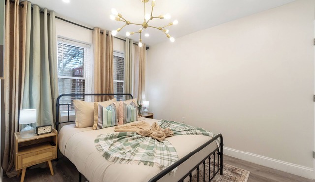Ground Level/Basement 1BR/2Queens apartment w Central AC + W/D & In-Unit Laundry