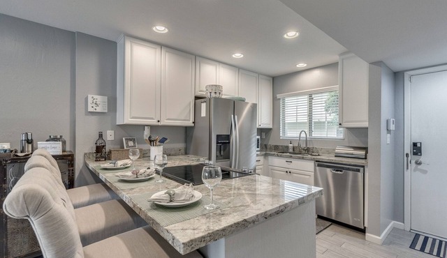 Ground Level Beautiful Remodeled Condo in Resort Setting In Downtown Scottsdale.