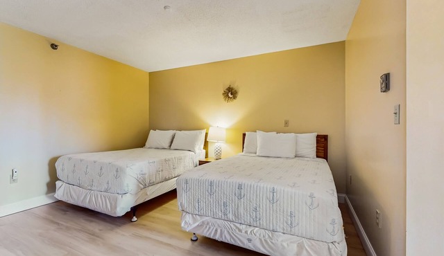 Ground Level Condo with Shared Pool, Firepit, Free WiFi, and Partial A/C