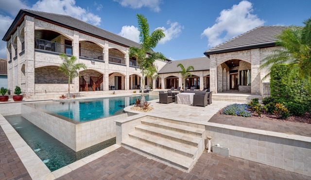 Groveland Home w/Pool: Luxurious Lakefront Oasis!