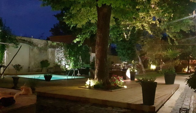 Guest house with 4 individually rented rooms.